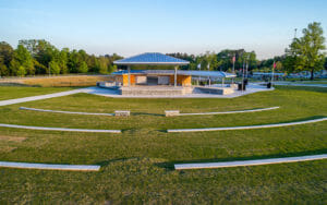 A park with benches and an amphitheater in the middle.