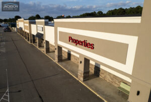 Commercial building with "Properties" sign.